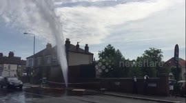 Burst water main cools Londoners on hottest day of the year