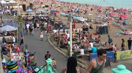 UK hottest day Brighton crowded beach
