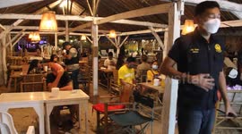 Dozens of revellers arrested at bar breaking Covid-19 ban in Thailand