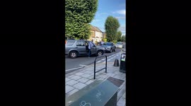 London motorist brandishes an AXE in bizarre street bust-up