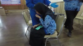 A Woman Afraid When A Nurse Ask Her to Swap Her Nose With Antigen for SWAP test