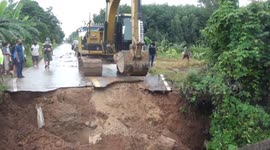 Bridge collapses following heavy rain injuring motorcycle rider in northern Thailand