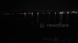 Look at the sea from carousel in night