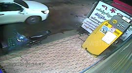 Bungling thieves caught on CCTV trying to steal ATM in a pick-up truck