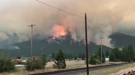 Dixie Fire spreads across hillside in California