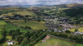 Drone footage captures aerial view of Lake District village after floods allegedly cause discharge of raw sewage into streets