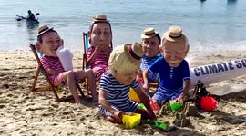 Pretend world leaders play in sand during recent G7 meet in Cornwall, UK