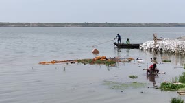 The boat man has trying to move safe places for heavy rain in Ganga river
