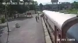 Woman nearly gets crushed beneath moving train in northern India