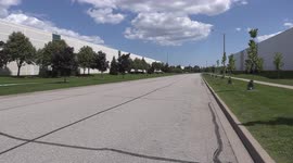 Heat waves rising off the pavement on road on hot sunny summer day make for a  superior Mirage image illusion phenomenon of water flooding the road but it's just the scorching heat