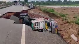 Truck swallowed up when sinkhole opens on road in central India