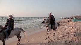 Gazans Hit The Beach As Summer Temperatures Soar