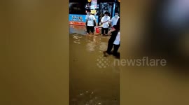 Flash floods brought by Typhoon Lupit strike city in southern China