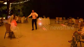 'Groom Surprises Bride with Epic Dance at Wedding Reception'