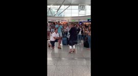 Staff at UK airport help set up surprise marriage proposal