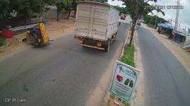 Terrifying moment tuk-tuk sent flying into air by overtaking truck