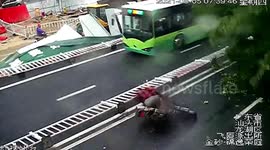 Strong winds blow over motorcyclist and send sea waves into air as Typhoon Lupit lands in southern China