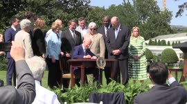 President of the United States Joe Biden signs an executive order with a goal to make 50% of new vehicles sold by 2030 zero-emission at The White House in Washington, D.C. on August 5, 2021