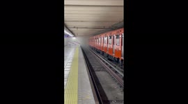 Smoke fills station in Mexico City, due to short circuit from a bicycle tyre on the track