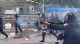 Thai police fire rubber bullets and tear gas at protesters in Bangkok