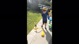 Toddler plays with Rockets and hits Dad in the Balls