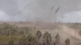 Terrifying footage from the eye of a tornado in Russia's Tver region