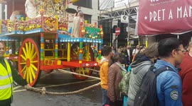 Hare Krishna devotees pull huge wooden chariot through London during celebrations for 'Rathayatra'