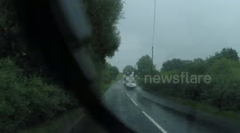Driving Through A Flooded Road During Thunderstorm