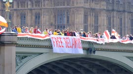 Pro-democracy Belarusians in London unfurl 'Free Belarus' protest banner on Westminster Bridge