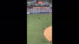 US: Ball Girl Takes Down Fan Running Onto Field At Dodger Stadium