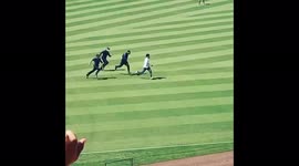 US: Ball Girl Takes Down Fan Running Onto Field At Dodger Stadium 3
