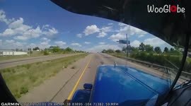 'CLOSE CALL - Truck Driver Barely Avoids Fatal Collision with Car'