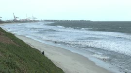 Surfers love Perth’s winter gales and rough seas – board surfers at Port Beach
