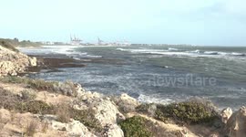 Surfers love Perth’s winter gales and rough seas – wind and kite surfers at Cottesloe Beach