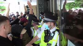 Scuffles as anti-vaccine protesters attempt to storm BBC's Television Centre in London