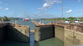 Panama Canal boat crossing to travel between the Atlantic and Pacific Ocean.