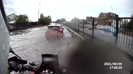 Motorcyclist films UK flooding on A41 exit towards A406