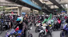 Thousands join colourful 'car mob' rally against Thai government