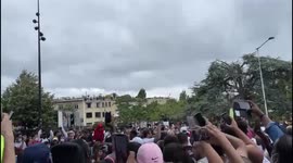 French football fans eagerly wait outside PSG's ground as Lionel Messi is expected to sign