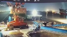 Cargo ship crashes into port and sinks crane in Shanghai, China