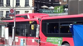 Woman killed after bus crashes into another at Victoria station, London