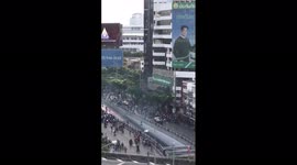 Tear gas thrown as clashes erupt between anti-government protesters and police in Bangkok