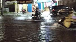 Heavy Rain Makes Flood on the Road
