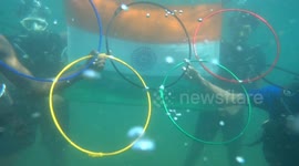 South Indian Scuba divers goes underwater to celebrate medal winners who played for India in Tokyo Olympics.