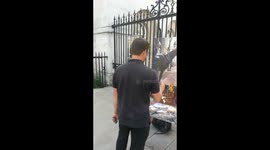 Queens Household Cavalry has his image painted while mounted on his horse at Horseguards Parade, London