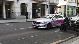 Colorful Car Drives Through Central London