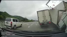 Russian dashcam catches shocking truck collision after botched overtake