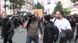 TV crew mistaken for BBC journalists confronted and pushed by anti-vaccine passport protesters in London