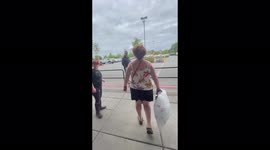 'It's America b***h!' Older couple harasses young woman over 'abolish ice' sticker