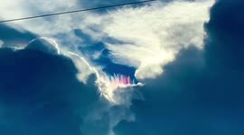 Rare and mesmerizing ribbons of rainbows paint Cape Canaveral skies